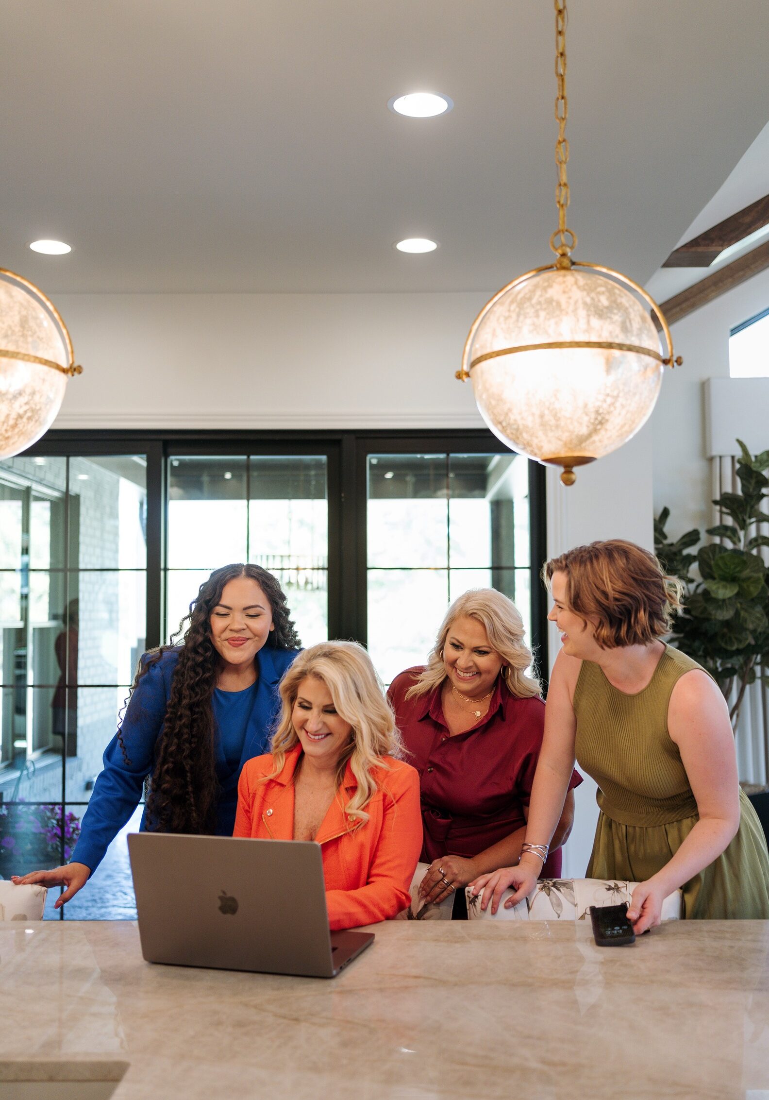 3B Realty Team working on finding an investment property for client in Cincinnati kitchen.